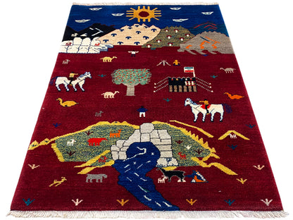 Tapis Gabbeh-Luri rouge et bleu avec représentations de paysages et d’animaux, franges