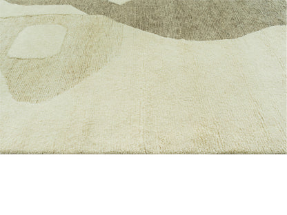 Teppich mit strukturierter Oberfläche in Creme und hellbraunem Muster