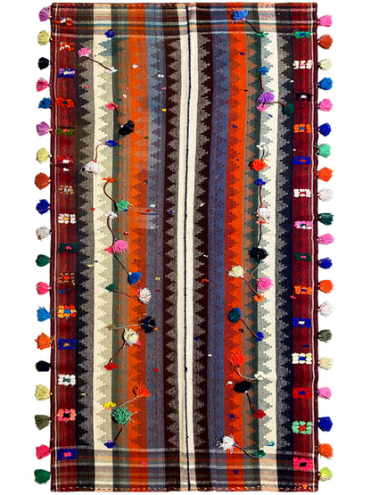 Schlafzimmer lebhafter Jajim Teppich aus Wolle mit bunten Troddeln