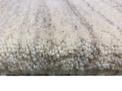 Nahaufnahme Flor: dichter, beiger Teppich mit feiner Struktur und kurzem Flor