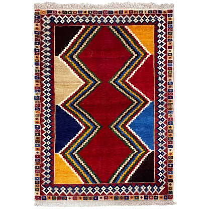 Shiraz-Teppich mit geometrischem Rauten-Design in Rot, Blau und Beige, rechteckig, Fransen.