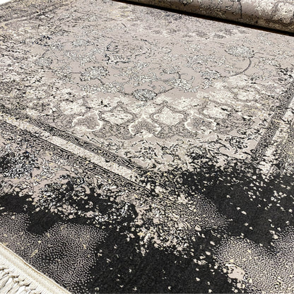 Pflegeleichter maschinengefertigter Teppich, grau schwarz Polypropylen, Used-Look Medaillon, Familienzimmer.