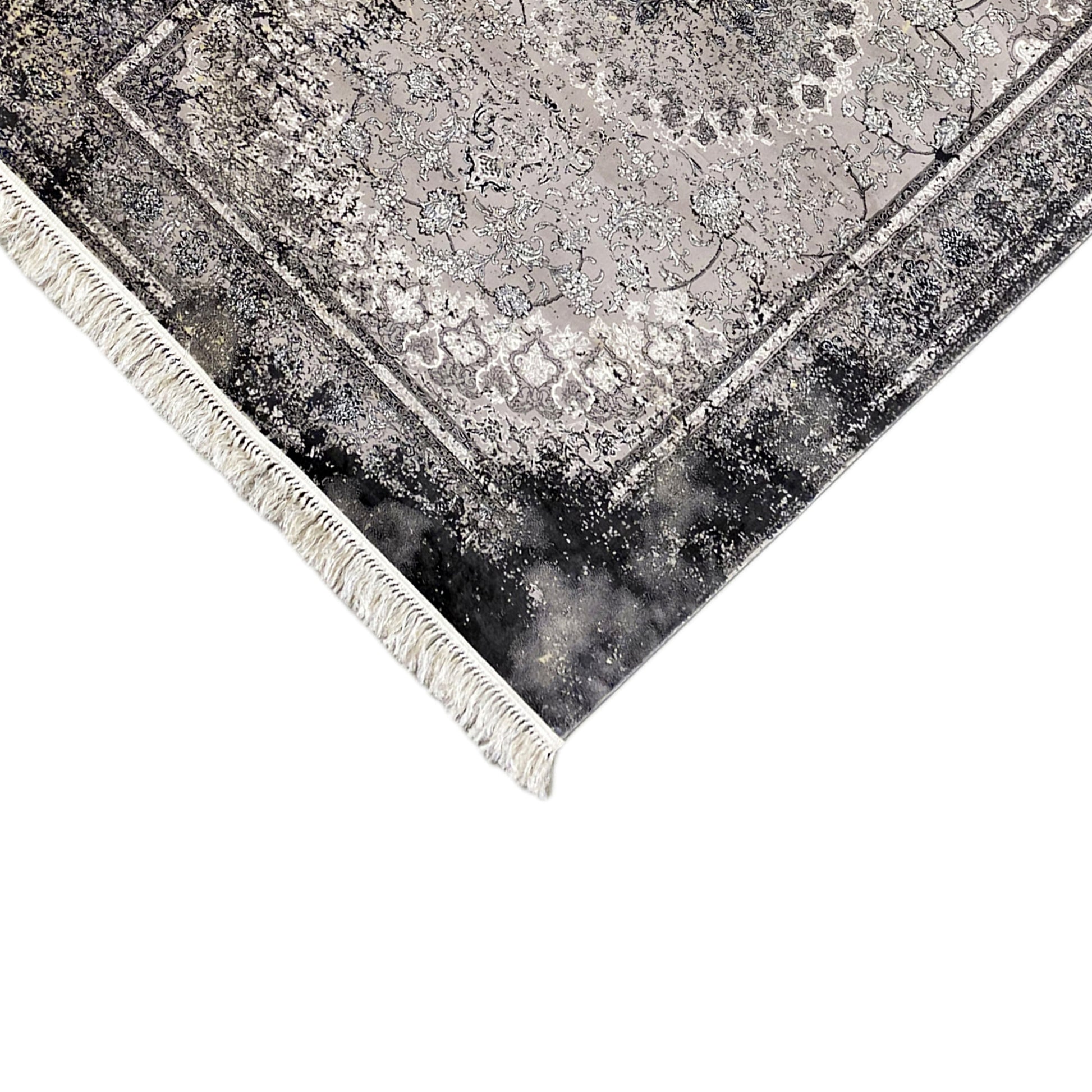 Grauer Wohnzimmerteppich, schwarze Used-Akzente, pflegeleichtes Polypropylen, moderne Wohndeko.